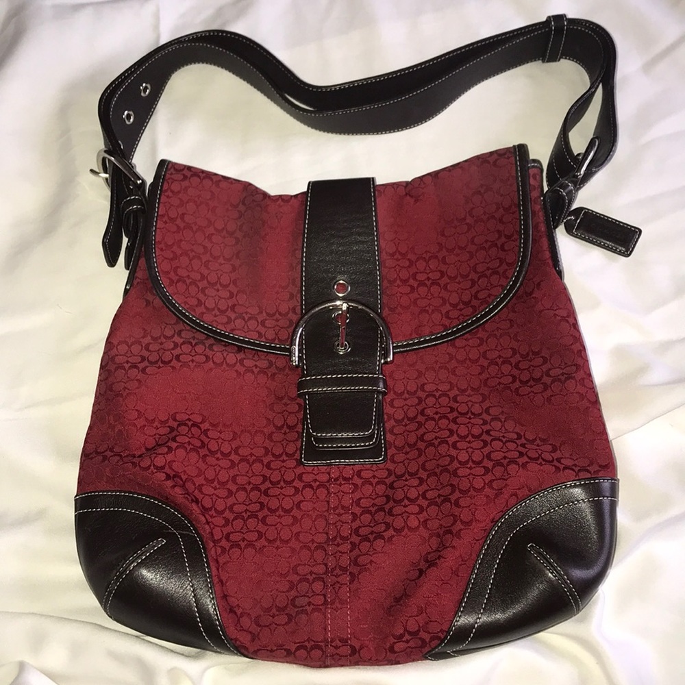 Dark brown and red Coach shoulder satchel